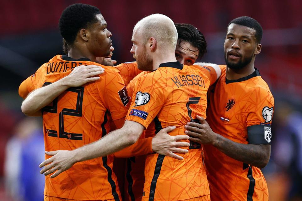 Georginio Wijnaldum, right, will captain the Dutch squad (EPA)