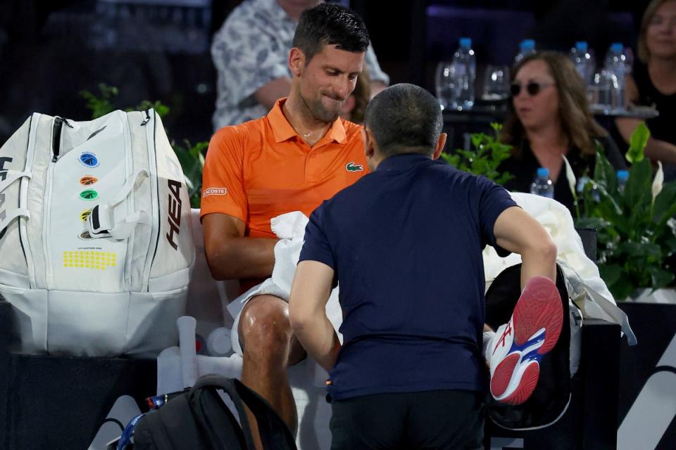 Novak Djokovic received treatment for a hamstring injury (Kelly Barnes/AP) (AP)