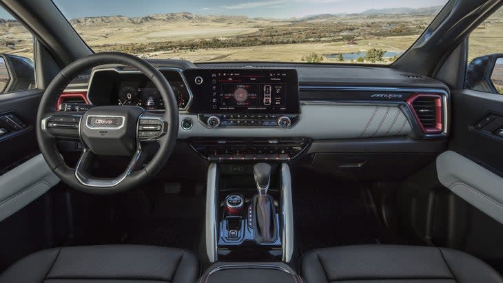 The red, white, and black interior is a little flashy, but extremely comfortable. (Photo: GMC)