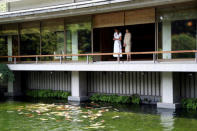 U.S. first lady Melania Trump and and Akie Abe, wife of Japanese Prime Minister Shinzo Abe view the koi carp pond at Akasaka State Guest House in Tokyo, Japan May 27, 2019. REUTERS/Athit Perawongmetha