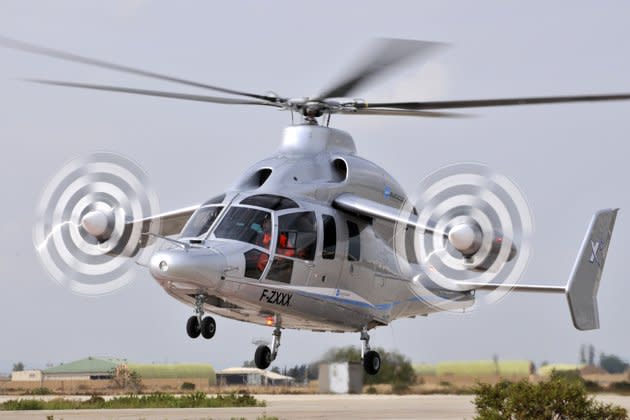 Eurocopter's X3 high-speed hybrid helicopter, which combines forward-facing propeller engines astride two short aircraft wings with overhead rotor blades, during a demonstration in September 2010. REUTERS/HO/Eurocopter/Penna