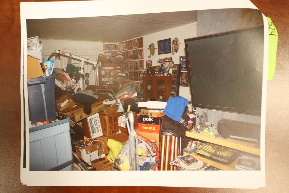 A scene from inside Bryan Patrick Miller's home during a police search. A detective described it as a "hoarding house."