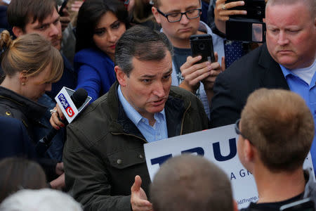 U.S. Republican presidential candidate Ted Cruz (R-TX) speaks with supporters of fellow candidate Donald Trump during a campaign event at The Mill in Marion, Indiana, U.S., May 2, 2016. REUTERS/Aaron P. Bernstein