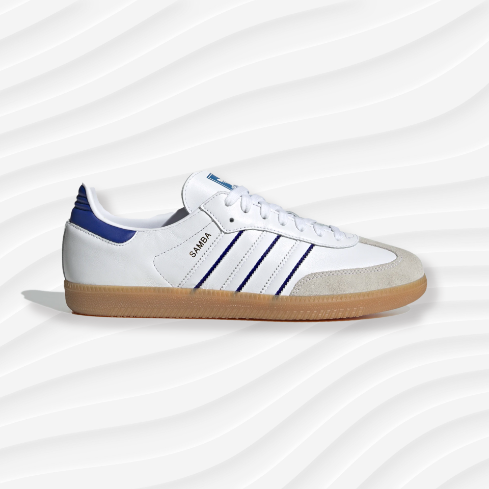 adidas samba in white and blue in front of a white wavy background