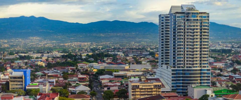 San Jose Costa rica capital city street view with mountains in the back