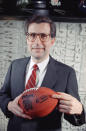 FILE - National Football League Commissioner Paul Tagliabue holds the official game ball to be used for the kickoff of Super Bowl XXIV in New Orleans, during a press conference in New York, in this Jan. 11, 1990, file photo. Tagliabue’s impact on the sport was massive — comparable to virtually any league leader. And after a year’s delay due to the COVID-19 pandemic, Tagliabue will enter the Canton, Ohio shrine. (AP Photo/Marty Lederhandler, File)