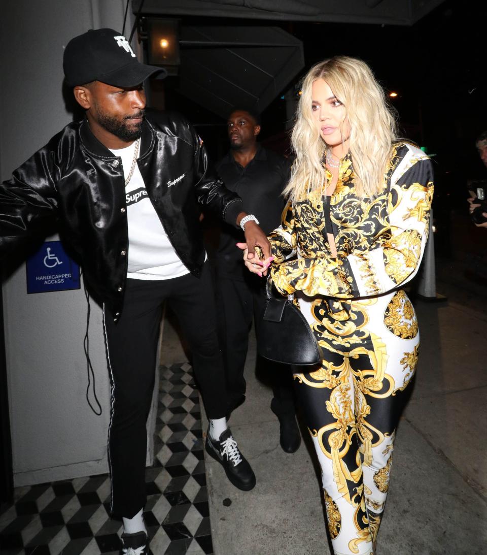 Khloe Kardashian and Tristan Thompson in the street