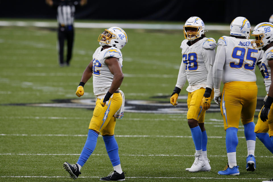 Los Angeles Chargers linebacker Uchenna Nwosu (42) celebrates a stop in the second half of an NFL football game against the New Orleans Saints in New Orleans, Monday, Oct. 12, 2020. (AP Photo/Butch Dill)