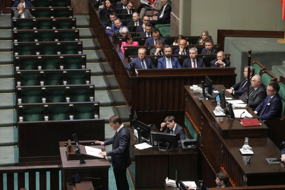 Poland's Foreign Minister Radek Sikorski delivers a speech to the parliament in Warsaw, Poland, on Thursday April 25, 2024. Sikorski told the parliament that the government wants to return to the group of countries which sets the agenda of the European Union, laying out the government's vision at a historically crucial moment with war across the border in Ukraine. (AP Photo/Czarek Sokolowski)