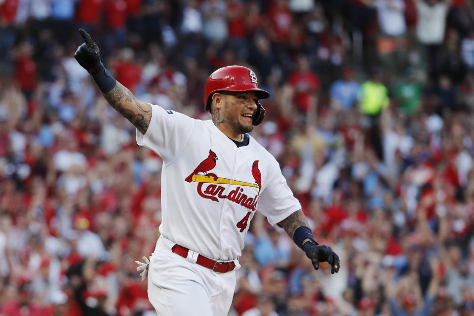 St. Louis Cardinals' Yadier Molina reacts after hitting an RBI-single during the eighth inning in Game 4 of a baseball National League Division Series against the Atlanta Braves, Monday, Oct. 7, 2019, in St. Louis. (AP Photo/Jeff Roberson)