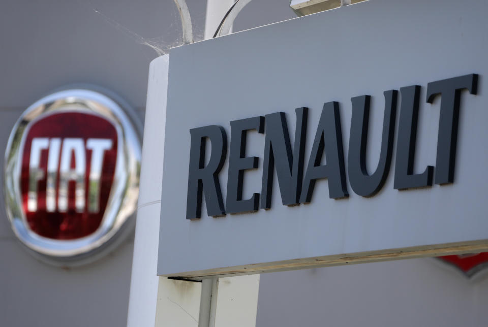 The logos of Renault and Fiat carmakers are seen in Nice, France, June 3, 2019.    REUTERS/Eric Gaillard