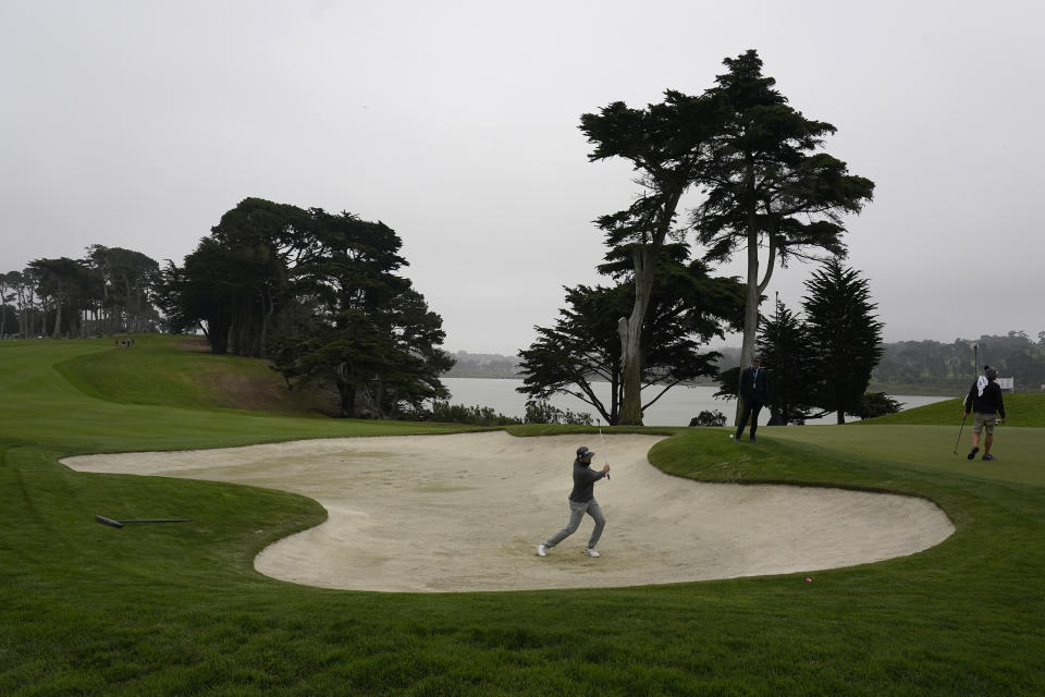 Mark Hubbard hits from a bunker to the 15th green during practice for the PGA Championship golf tournament at TPC Harding Park in San Francisco, Tuesday, Aug. 4, 2020. (AP Photo/Jeff Chiu)