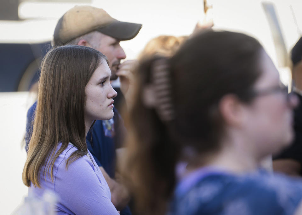 People listen during a news conference at which authorities announced that the body of 11-year-old Audrii Cunningham had been found in the Trinity River, Tuesday, Feb. 20, 2024, in Livingston, Texas. (Jason Fochtman/Houston Chronicle via AP)