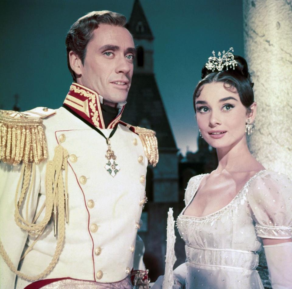 <p>Audrey Hepburn's diamond chandelier tiara and earrings complimented her ornate hairstyle and Regency-era dress for the film, <em>War and Peace</em>. The actress costarred in the picture with her then-husband, Mel Ferrer. </p>