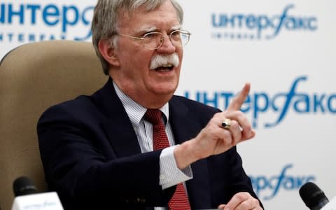 Mr Bolton takes questions at a press conference in Moscow on Wednesday - Credit: Alexander Zemlianichenko/AP