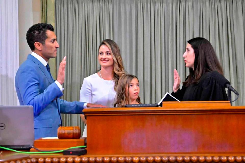 Robert Rivas is sworn in as speaker of the California Assembly by Chief Justice Patricia Guerrero in Sacramento on Friday as his wife and daughter, Christen and Melina Rivas, stand with them