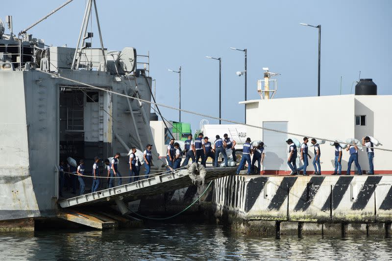 FILE PHOTO: Mexican Navy personnel prepare a shipment of food and medicine for Cuba, in Veracruz