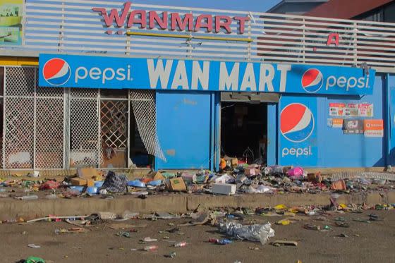 A damaged shop, showing the aftermath of looting, can be seen here in Port Moresby on Jan. 10, 2024.<span class="copyright">STR,AFP—Getty Images</span>