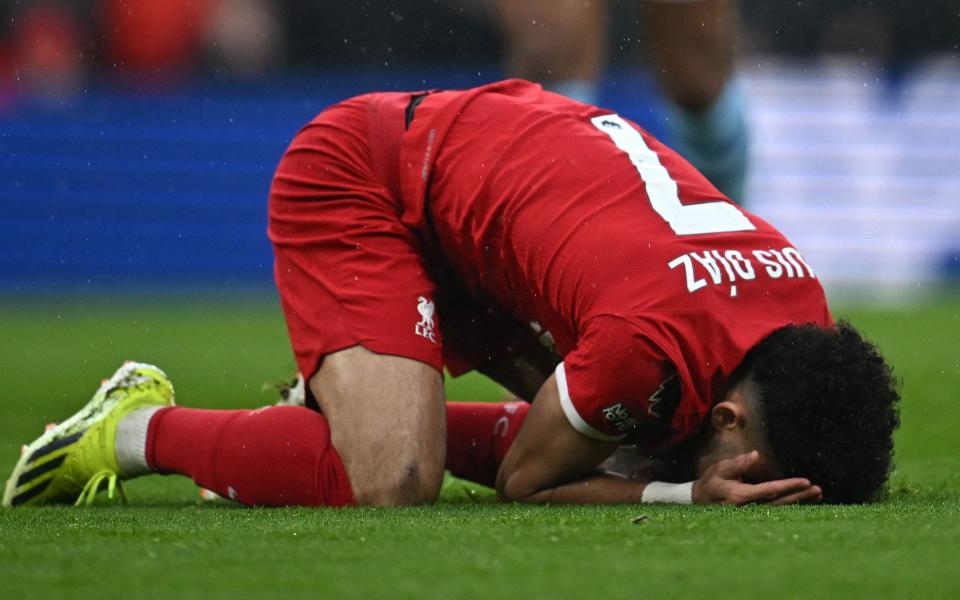 Liverpool's Colombian midfielder #07 Luis Diaz reacts after failing to score during the English Premier League football match between Liverpool and Manchester City