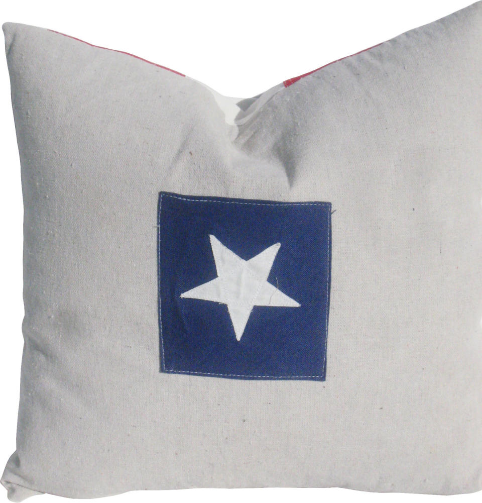 Custom pillow made from vintage American flag. Hidden zipper.  <strong>From</strong>: <a href="https://www.onekingslane.com/sales/20059?utm_source=HuffPo&utm_medium=display&utm_content=HuffPO&utm_campaign=flags" target="_blank">One Kings Lane</a>