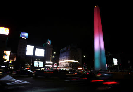 The Obelisk is lit up with the colours of the Mexican flag honouring the victims of the Mexico's earthquake, in Buenos Aires, Argentina September 20, 2017. REUTERS/Agustin Marcarian