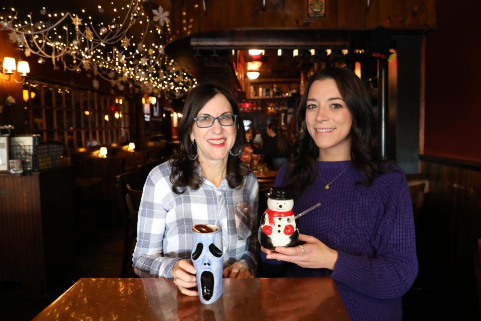 Lohud food reporter Jeanne Muchnick and Horsefeathers owner Julia McCue with some of McCue's cocktail creations, at the restaurant in Tarrytown Jan. 11, 2024.