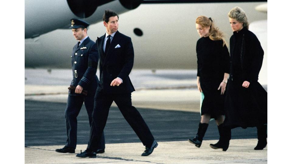 Prince Charles, Princess Diana and Sarah Ferguson, Duchess of York, return to England with the coffin of their friend Major Hugh Lindsay at RAF Northolt 