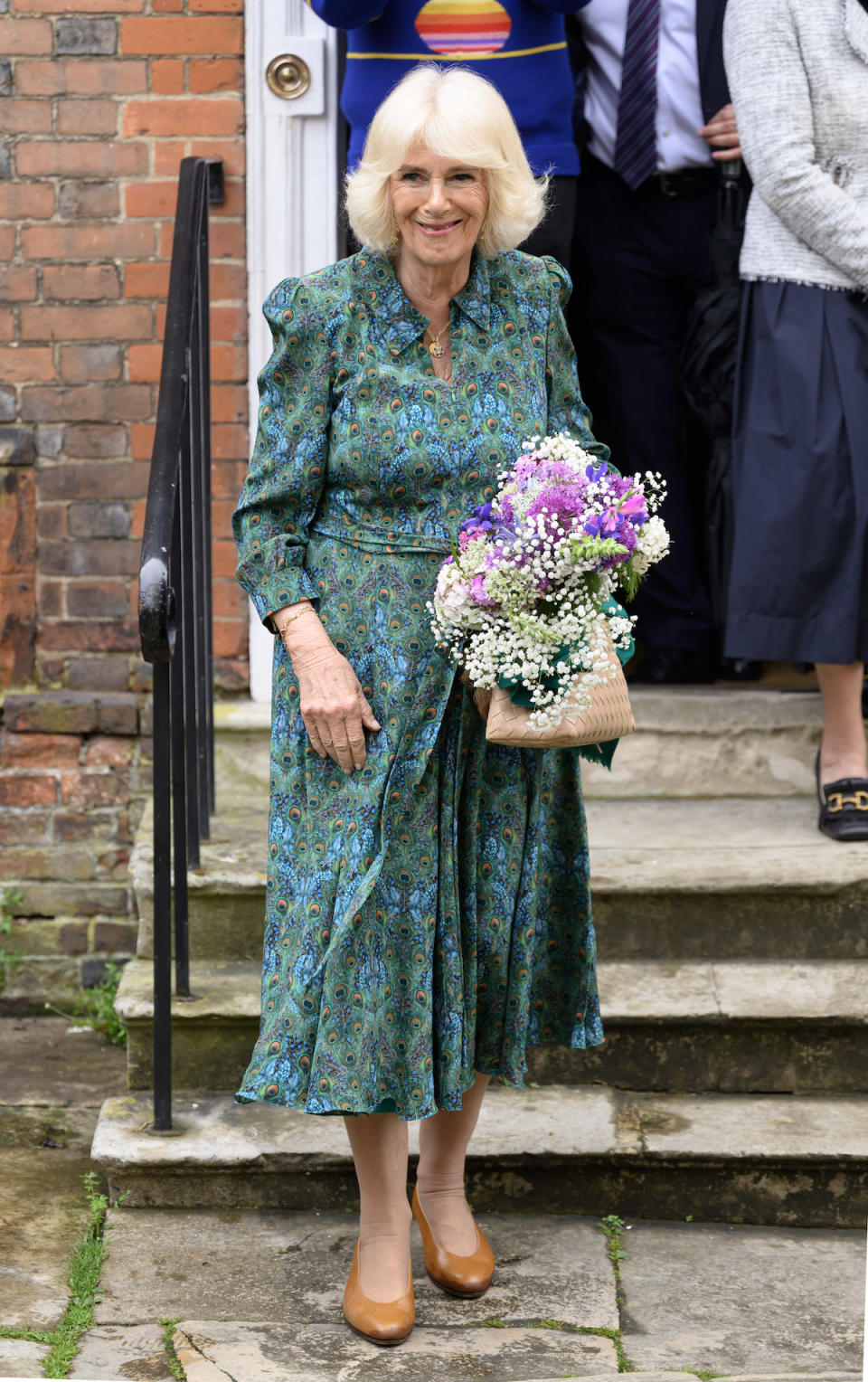 Queen Camilla in kitten heel shoes meets members of the local community at the Church of Saint Mary in Rye, East Sussex, UK on 16th May 2024