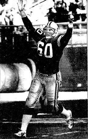 Green Bay Packers center Blake Moore celebrates a touchdown during the 1985 season.