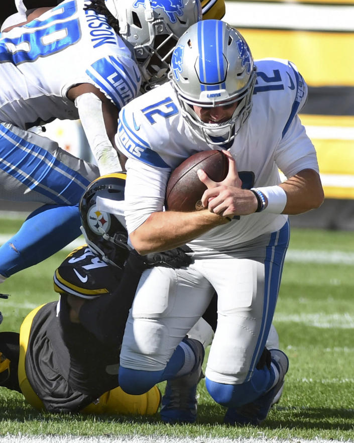 Pittsburgh Steelers safety Minkah Fitzpatrick (39), left, tackles Detroit Lions quarterback Tim Boyle (12) during the first half of an NFL preseason football game, Sunday, Aug. 28, 2022, in Pittsburgh. (AP Photo/Fred Vuich)