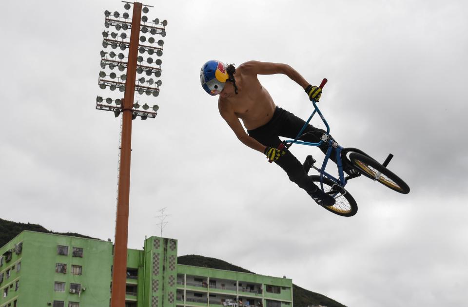 Venezuelan cyclist Daniel Dhers jumps with his bike on a ramp during a training session at the National Sports Institute in Caracas, on January 17, 2020. - Daniel Dhers, winner of several medals in different BMX Free Style championships, visited Caracas to practice in various parts of the city as part of his preparation to participate in the Tokyo 2020 Olympic Games. (Photo by Yuri CORTEZ / AFP) (Photo by YURI CORTEZ/AFP via Getty Images)