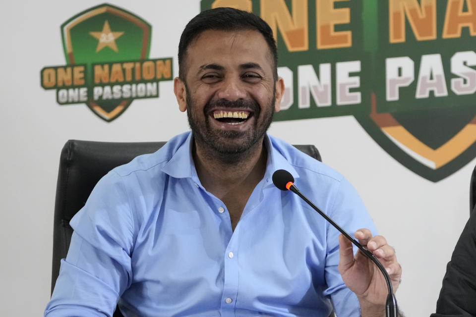 Pakistan's cricket team's Chief Selector Wahab Riaz reacts on a question as he speaks during a press conference, in Lahore, Pakistan, Tuesday, Dec. 19, 2023. Pakistan named several uncapped players and recalled opening batter Sahibzada Farhan after five years for the five-match Twenty20 series against New Zealand. (AP Photo/K.M. Chaudary)