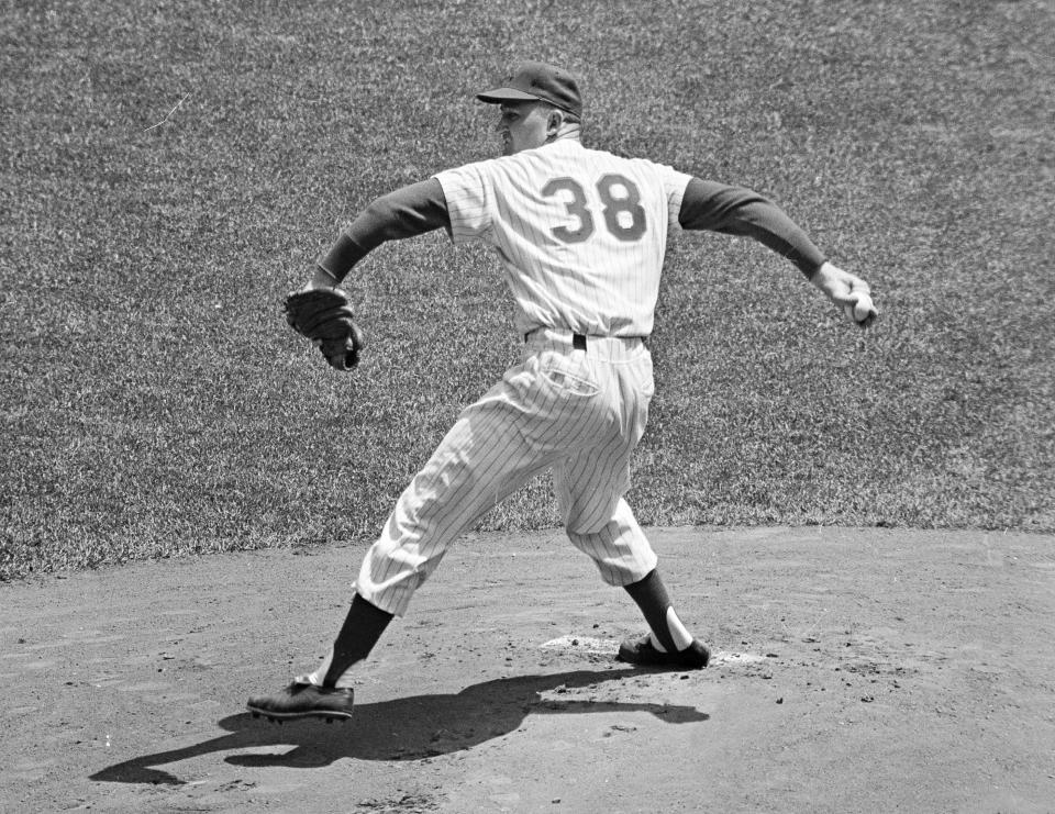 FILE - New York Mets pitcher Roger Craig throws against the Milwaukee Braves at the Polo Grounds in New York City, May 12, 1962. Craig, who pitched for three championship teams during his major league career and then managed the San Francisco Giants to the 1989 World Series that was interrupted by a massive earthquake, died Sunday, June 4, 2023. He was 93. (AP Photo/ H. Harris, File)