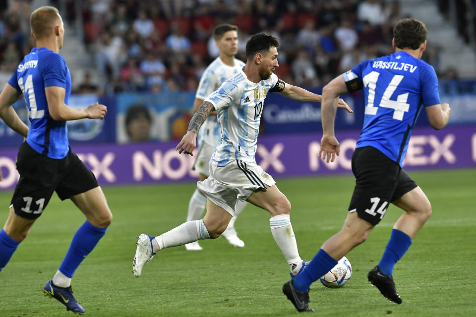 Argentina's Lionel Messi in action during friendly match against Estonia at El Sadar stadium in Pamplona, northern Spain, Sunday, June 5, 2022. (AP Photo/Alvaro Barrientos)