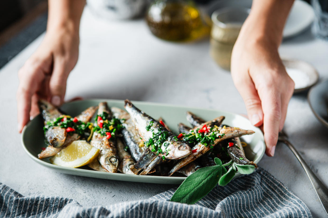 Eating small fish is good for your health. What to know. (Getty Creative)