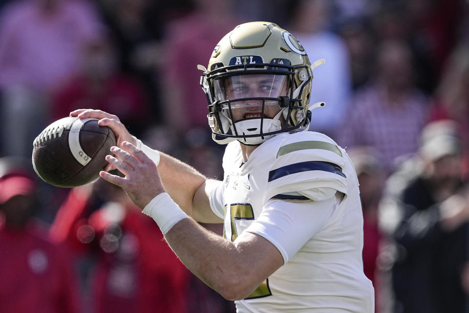 FILE - Georgia Tech quarterback Zach Gibson (15) throws a pass during an NCAA college football game against Georgia Saturday, Nov. 26, 2022 in Athens, Ga. Georgia Tech opens their season at home against Louisville on Sept. 1. (AP Photo/John Bazemore, File)