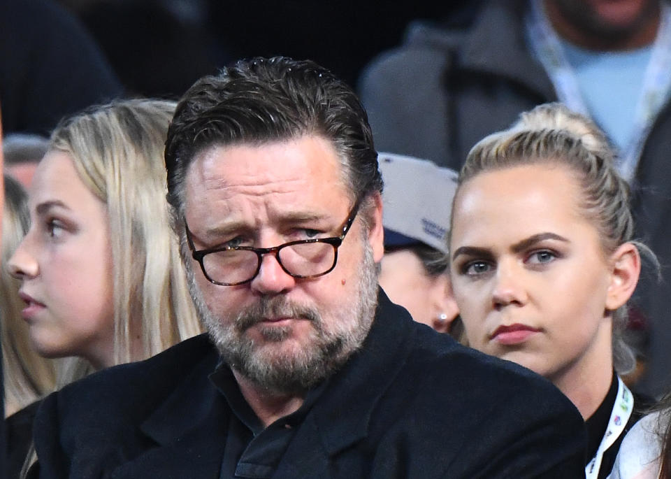 Russell Crowe watches on during the International Basketball Friendly match in Melbourne in 2019.