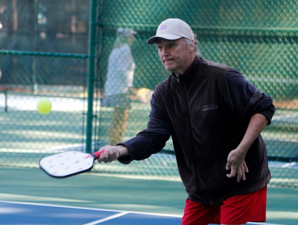 Terry Patterson follows through on a return during a pickleball match at The Landings Club's Franklin Creek Tennis Center on Oct. 20, 2022.
