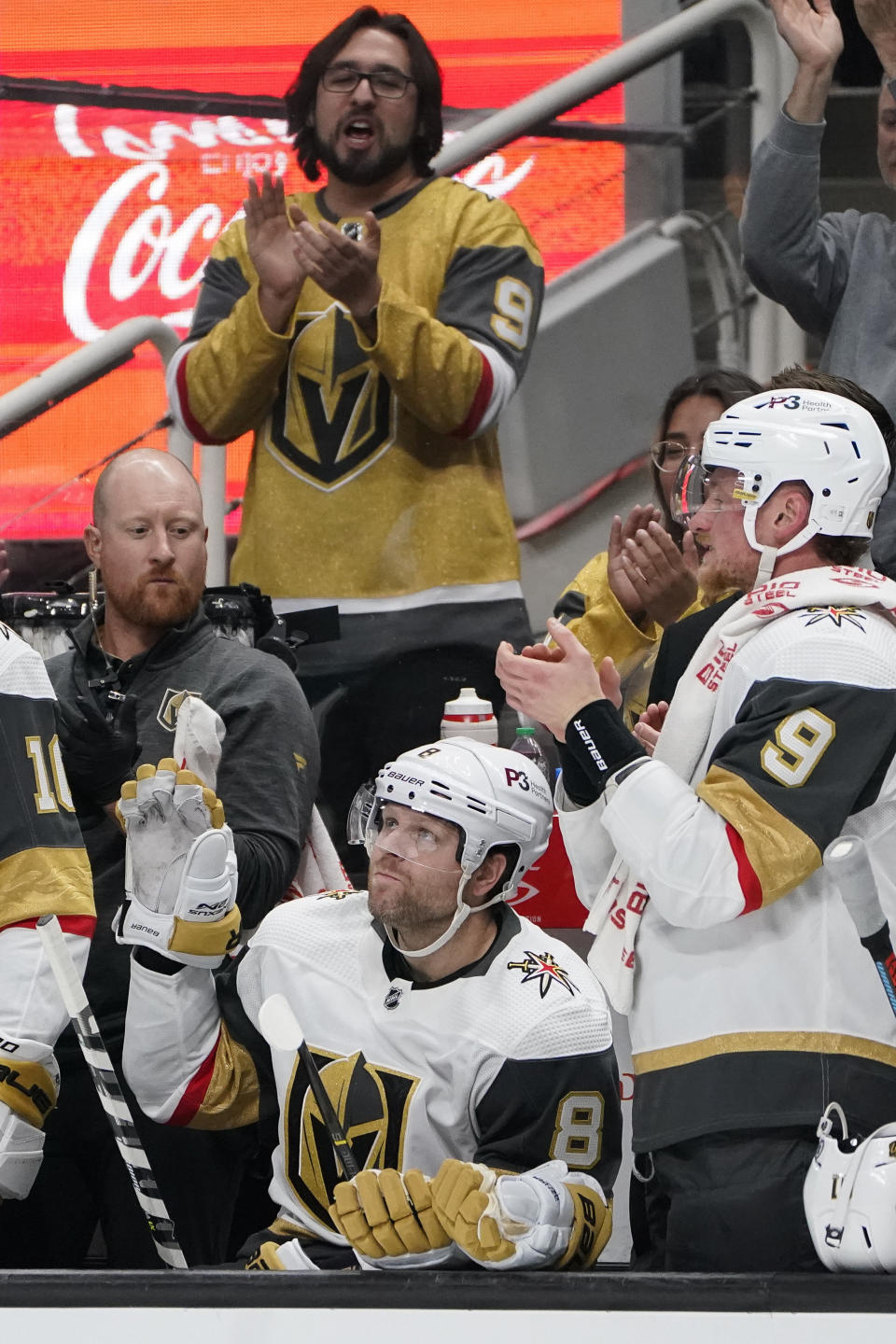 Vegas Golden Knights center Phil Kessel (8) waves to the crowd while being congratulated for playing his 990th consecutive game during the first period of an NHL hockey game against the San Jose Sharks in San Jose, Calif., Tuesday, Oct. 25, 2022. (AP Photo/Godofredo A. Vásquez)