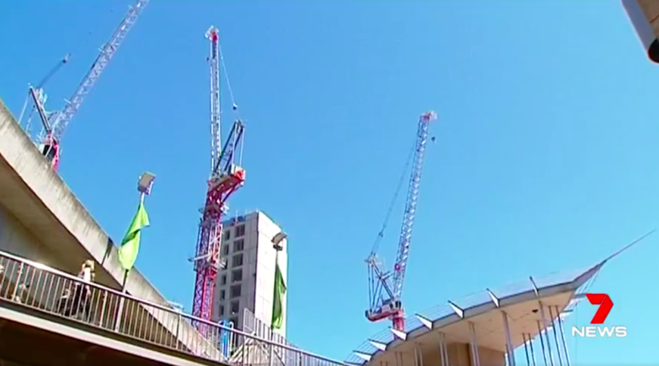 A man, from France, has been charged after a crane base jump over Sydney's Darling Harbour.