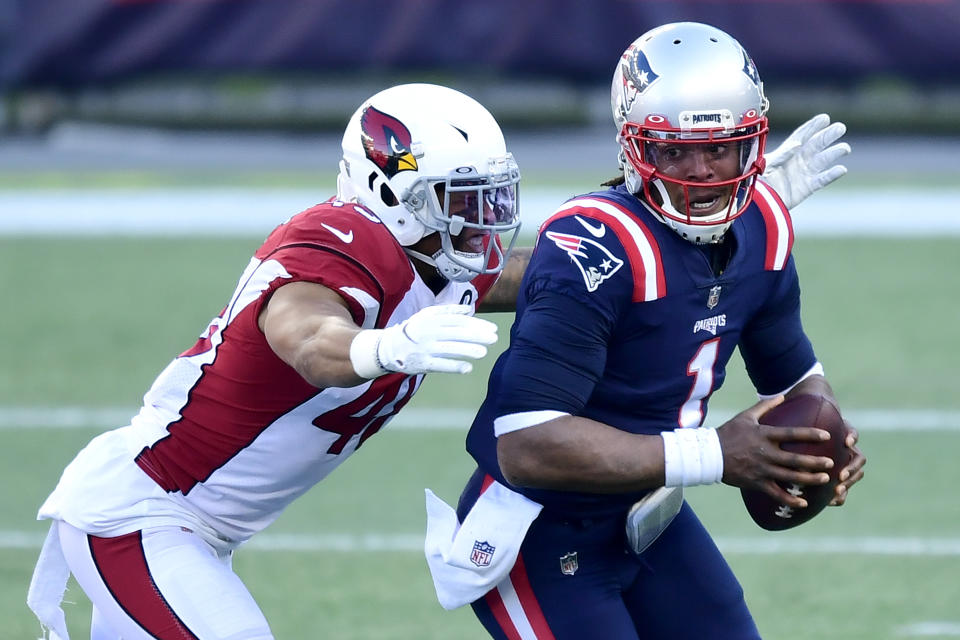 Arizona's Isaiah Simmons hit Cam Newton hard on the last drive, and the ensuing penalty helped the Patriots win. (Photo by Billie Weiss/Getty Images)