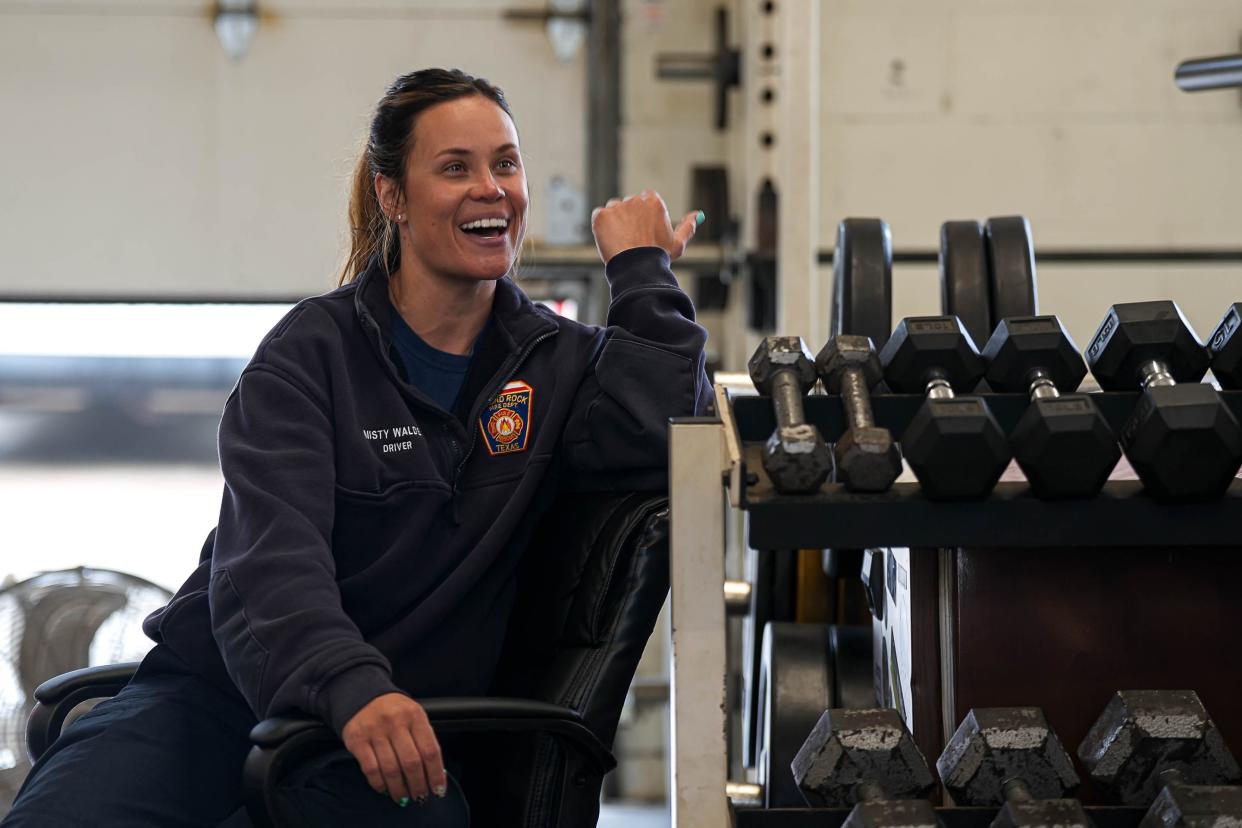 Acting Lt. Misty Walden talks to the team at Round Rock Fire Station No. 2. "You just have to be willing to put yourself out there and get uncomfortable so that you can get better," she said of earning respect from her male colleagues.