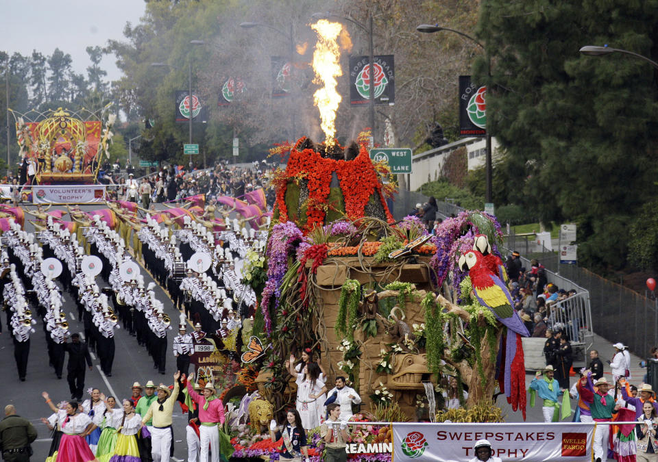 The Dole float "Dreaming of Paradise," winner of the top prize_ the Sweepstakes trophy for the most beautiful entry_ makes its way in the 124th Rose Parade in Pasadena, Calif., Tuesday, Jan. 1, 2013. (AP Photo/Reed Saxon)