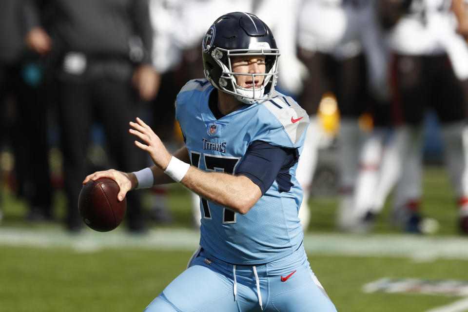 Tennessee Titans quarterback Ryan Tannehill scrambles against the Cleveland Browns in the first half of an NFL football game Sunday, Dec. 6, 2020, in Nashville, Tenn. (AP Photo/Wade Payne)