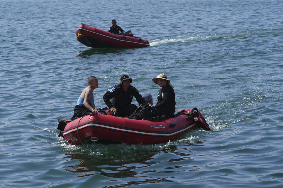 Members of the Navy and the Urgent Medical Rescue Squadron (ERUM) dive in search of bodies, weeks after the passing of Hurricane Otis, in Acapulco, Mexico, Saturday, Nov. 11, 2023. It was 12:20 a.m. on Oct. 25. when Hurricane Otis made landfall in this Pacific port city as a Category 5 hurricane, leaving 48 dead, mostly by drowning, and 31 missing, according to official figures. Sailors, fishermen and relatives of crew members believe that there may be more missing because sailors often go to take care of their yachts when a storm approaches. (AP Photo/Marco Ugarte)