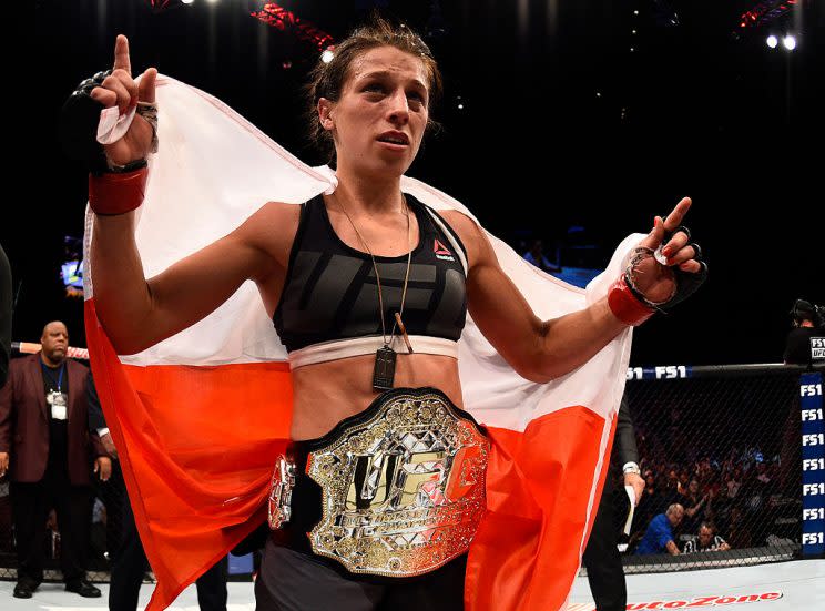 Joanna Jedrzejczyk celebrates after her decision win over Claudia Gadelha on Friday. (Getty)