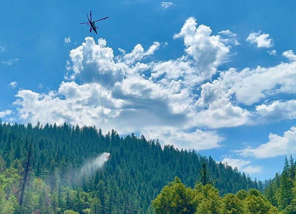 U.S. Forest Service officials say "Helicopters have been a vital part of firefighting operations throughout the duration of the Yeti Fire."