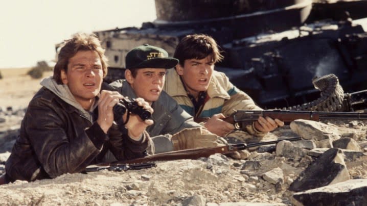 Patrick Swayze and Charlie Sheen defend the US from Soviet Invasion in Red Dawn.