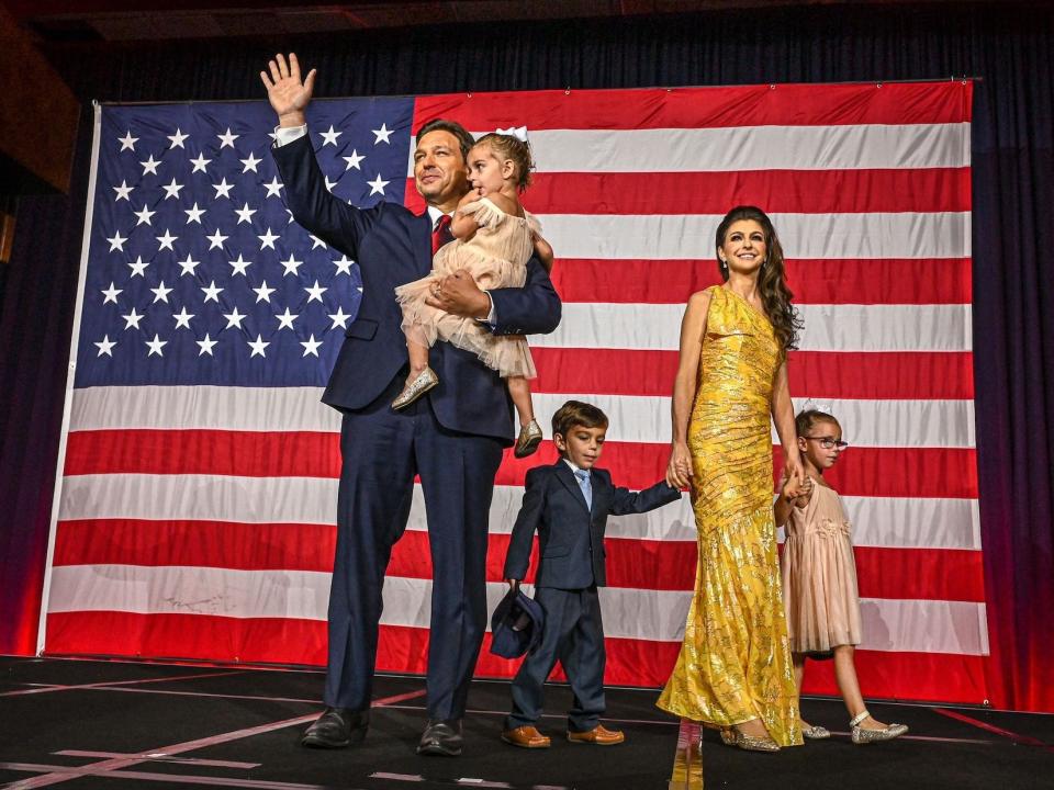 Republican gubernatorial candidate for Florida Ron DeSantis with his wife Casey DeSantis and children Madison, Mason and Mamie, waves to the crowd during an election night watch party at the Convention Center in Tampa, Florida, on November 8, 2022.