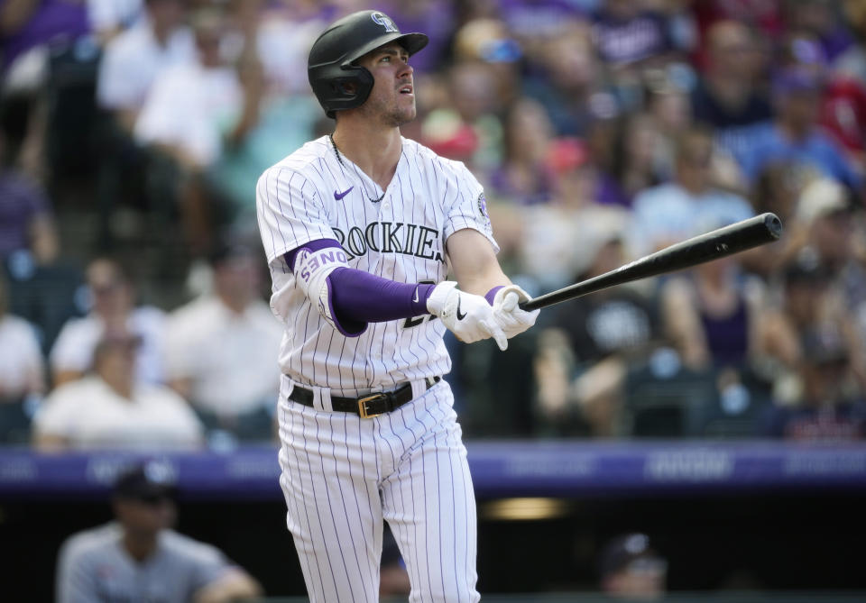 Colorado Rockies' Nolan Jones watches his solo home run off Minnesota Twins starting pitcher Bailey Ober while heading up the first-base line in the fourth inning of a baseball game, Sunday, Oct. 1, 2023, in Denver. (AP Photo/David Zalubowski)